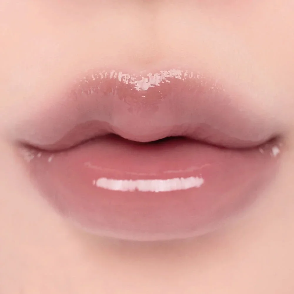 Стойкий блеск для эффекта стеклянных губ rom&nd Glasting Color Gloss 05 Dim Mauve 05