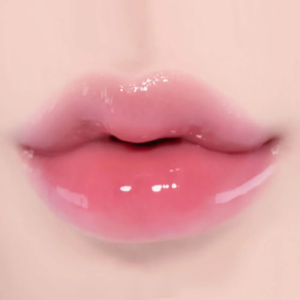 Увлажняющий 3D-блеск для объёма губ fwee 3D Voluming Gloss A03 Candy A03, candy